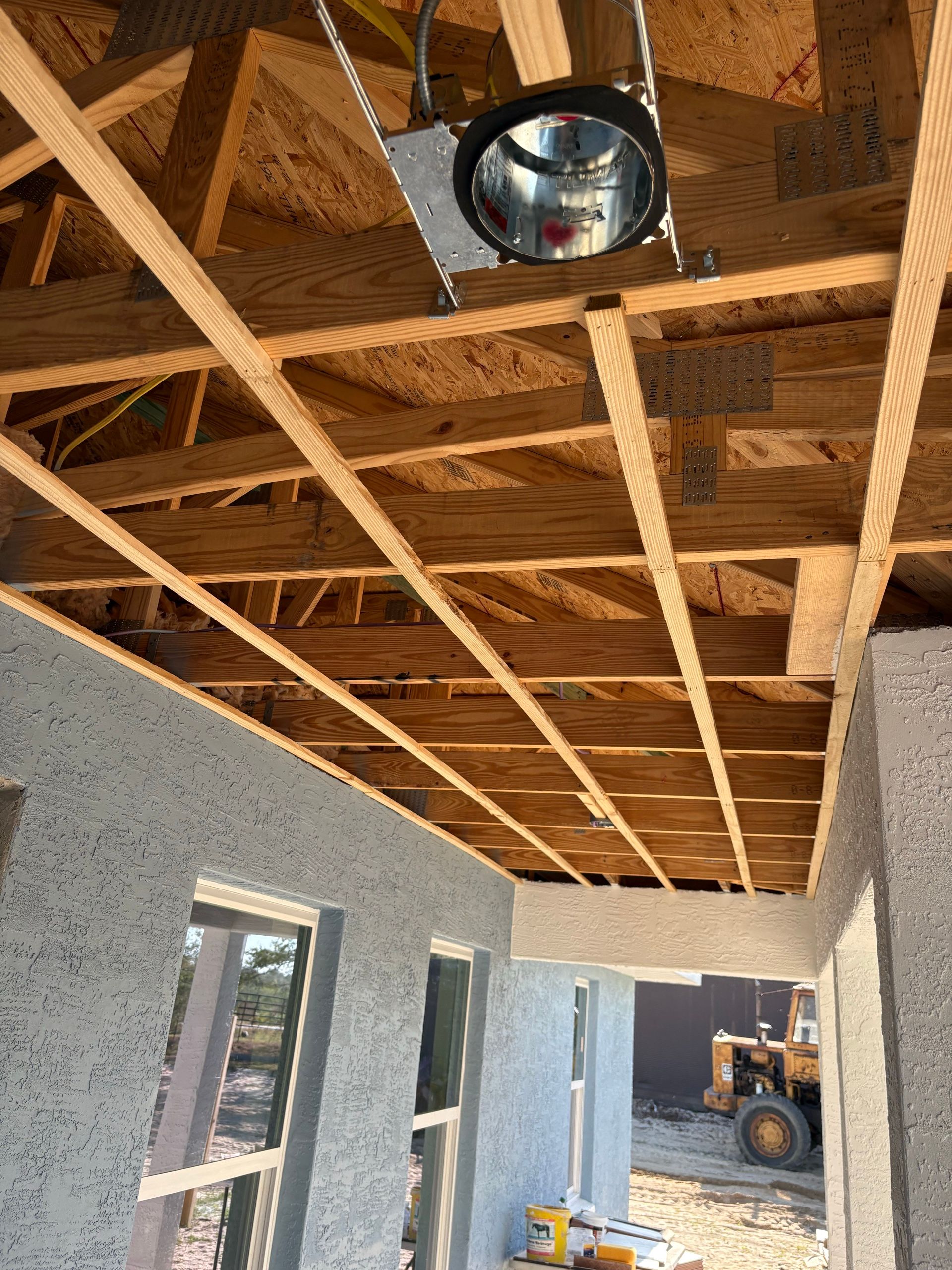 Exposed wood framing in the Archer home during construction